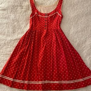 Handmade vintage 1960’s fit and flare dress. Red with flower details.
